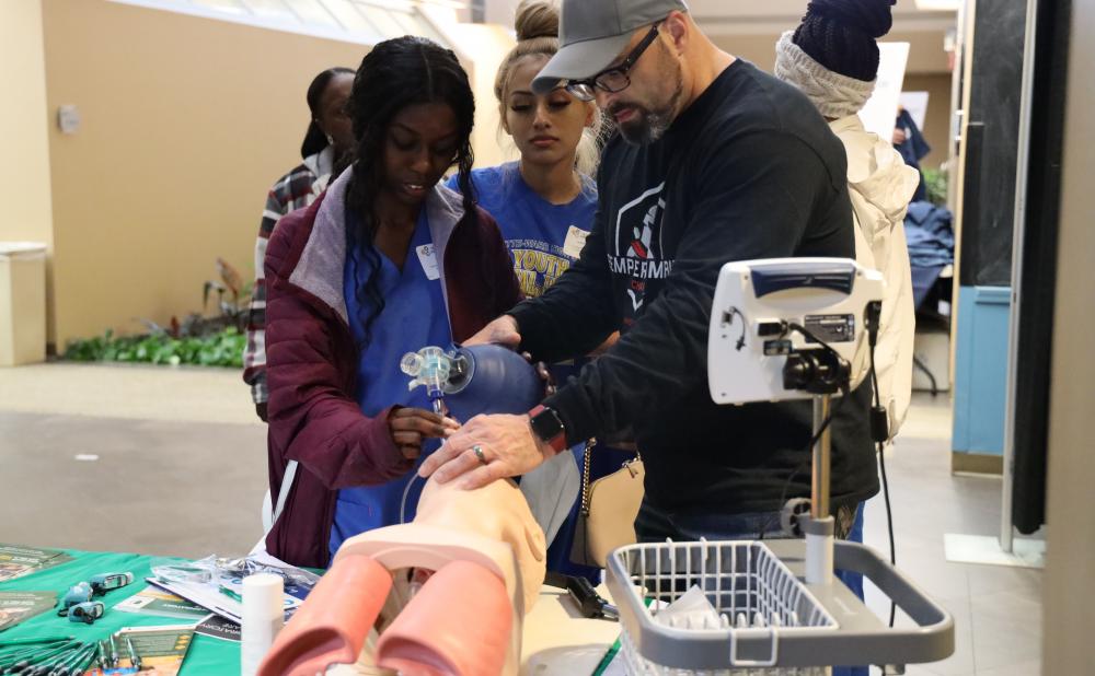 TN HOSA sponsor showing proper respiratory care technique