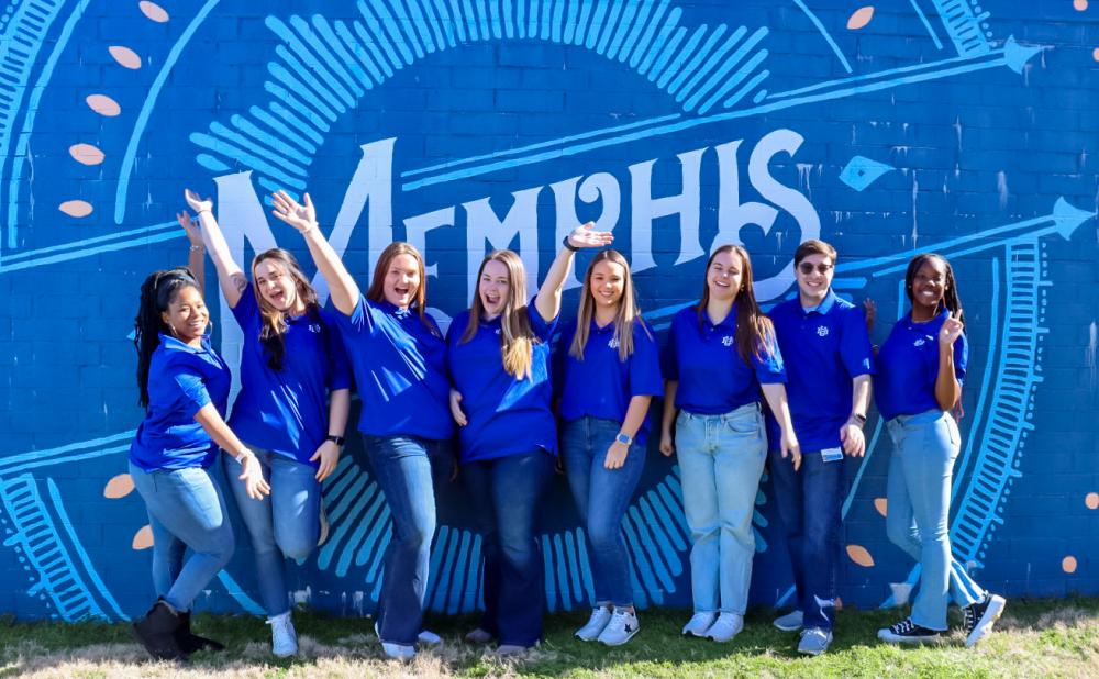 Group of Presidential Ambassadors in front of our i love memphis mural