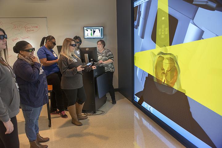 Students using the VERT in radiation therapy