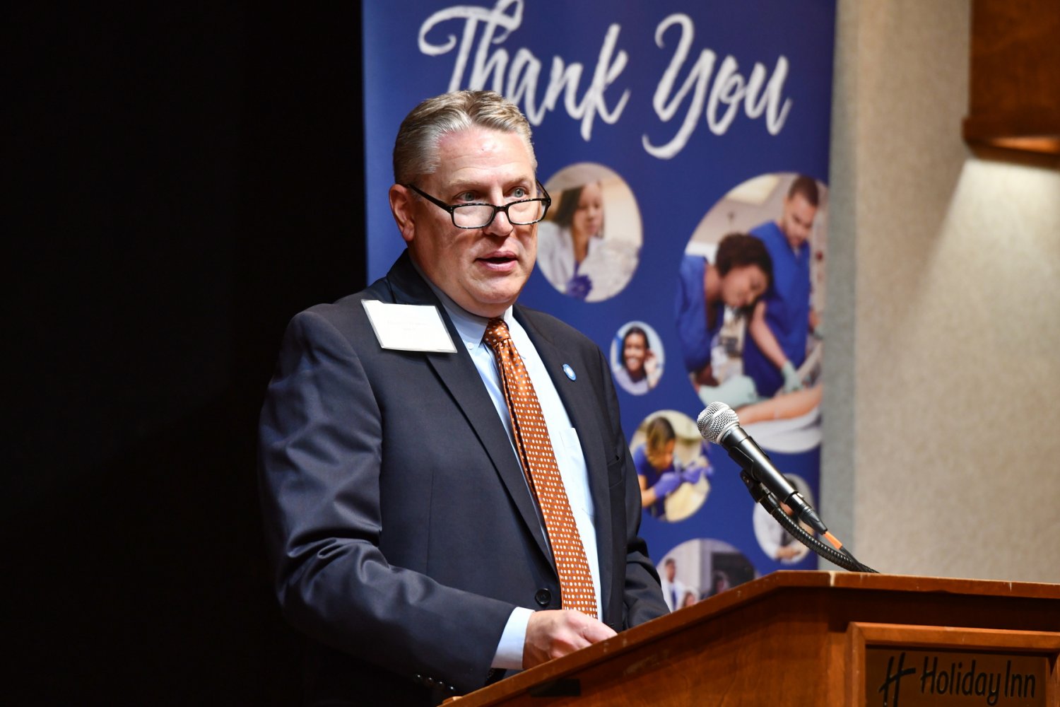 dr hopkins giving a speech 