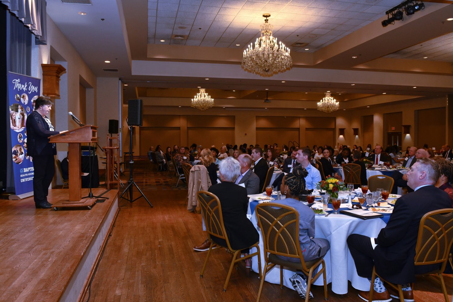 donna mars giving a speech 