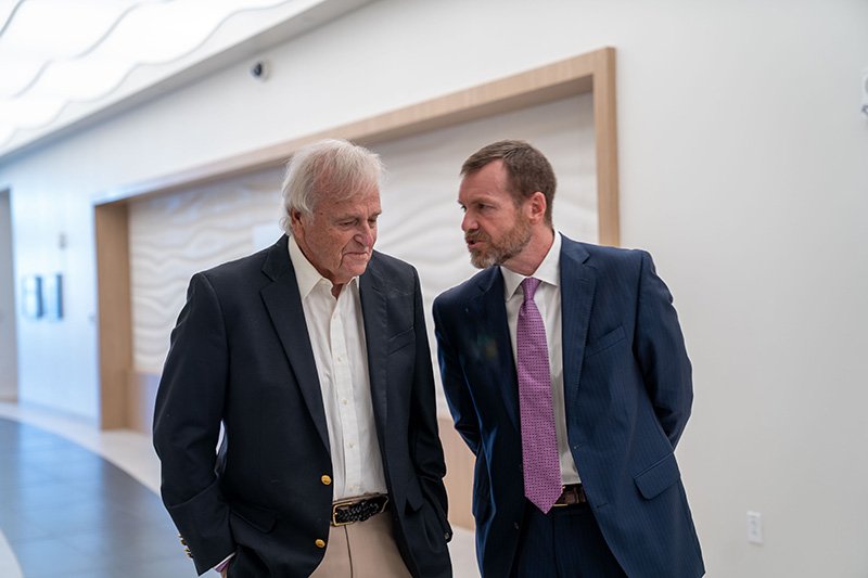 Two individuals talking