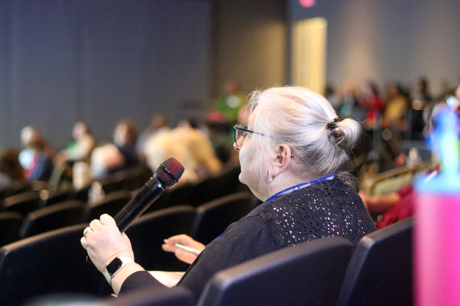 a person holding a microphone