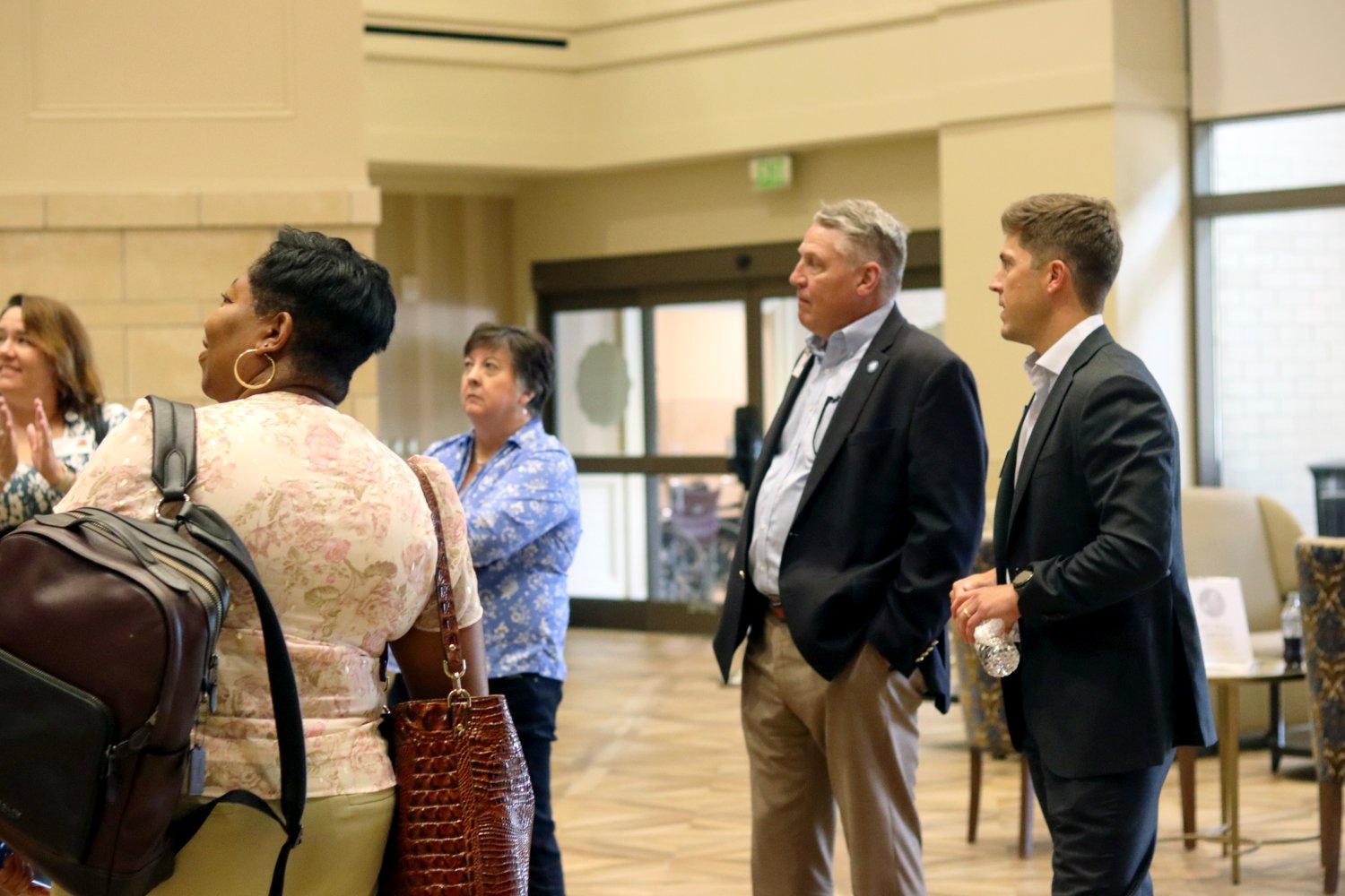 Brian Welton and Baptist North Mississippi staff guide BHSU visitors through the hospital lobby area during a facility tour.