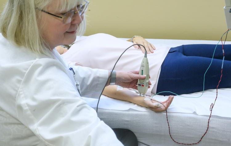 NDT Technologist performing a nerve conduction study