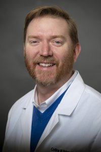 Headshot of Collins Rainey, Assistant Dean OMS-3