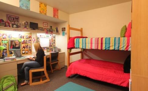 student in dorm room